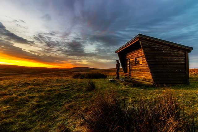 tiny home out in an open field